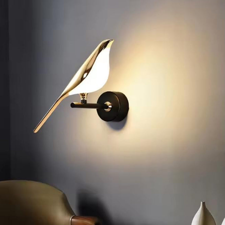 Sculptural bird accent wall sconce