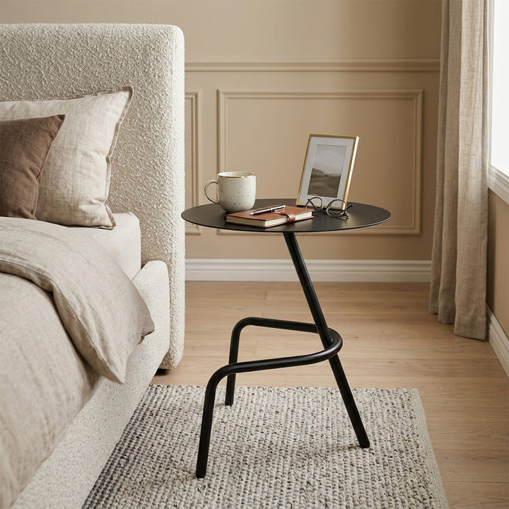 Metal round side table with loop base